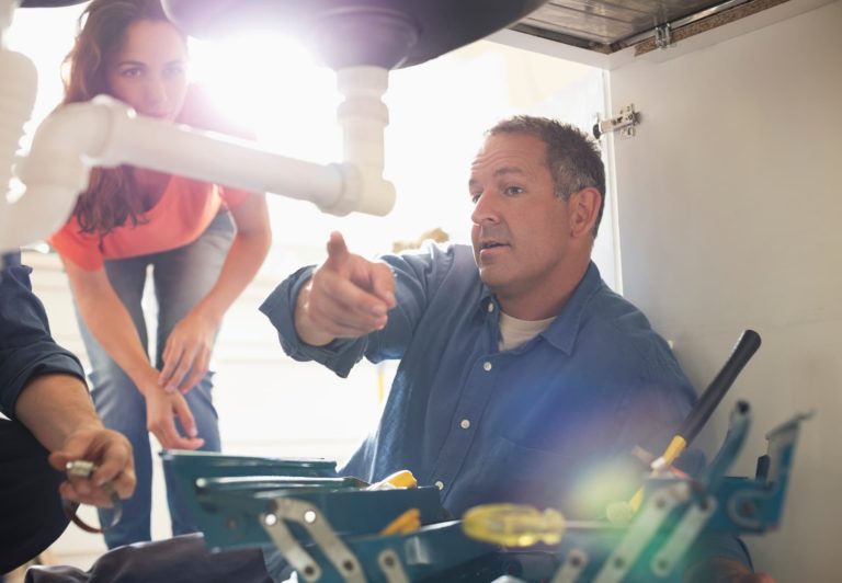 plumber giving advice on water management